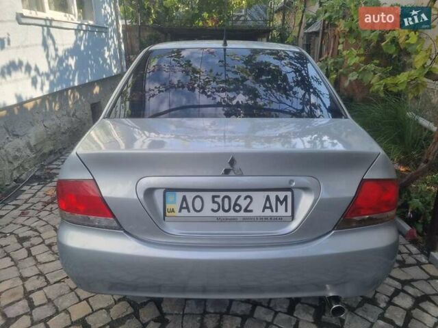 Сірий Міцубісі Lancer, об'ємом двигуна 1.6 л та пробігом 290 тис. км за 3850 $, фото 14 на Automoto.ua