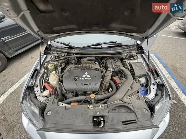 Сірий Міцубісі Lancer, об'ємом двигуна 2 л та пробігом 253 тис. км за 8700 $, фото 47 на Automoto.ua