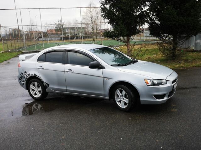 Серый Мицубиси Лансер, объемом двигателя 2 л и пробегом 260 тыс. км за 5200 $, фото 4 на Automoto.ua