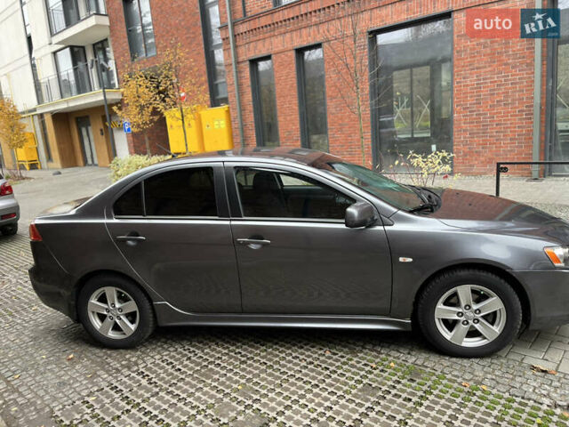 Сірий Міцубісі Lancer, об'ємом двигуна 2 л та пробігом 131 тис. км за 4899 $, фото 2 на Automoto.ua