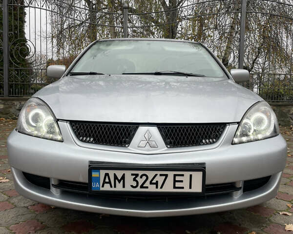 Сірий Міцубісі Lancer, об'ємом двигуна 1.59 л та пробігом 219 тис. км за 4500 $, фото 1 на Automoto.ua