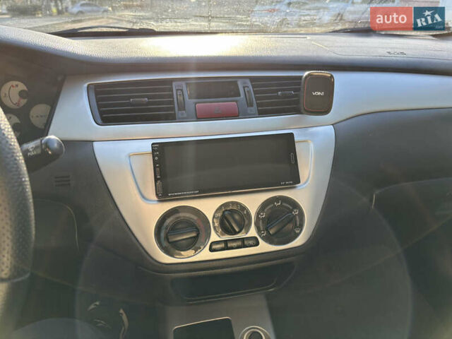 Серый Мицубиси Лансер, объемом двигателя 1.6 л и пробегом 193 тыс. км за 4000 $, фото 16 на Automoto.ua