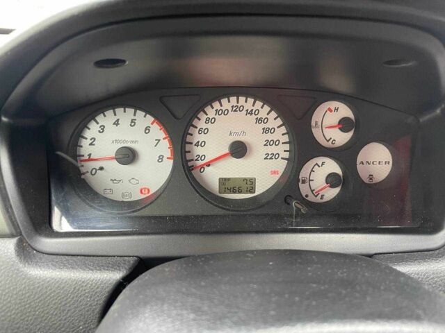 Серый Мицубиси Лансер, объемом двигателя 1.6 л и пробегом 146 тыс. км за 5990 $, фото 18 на Automoto.ua