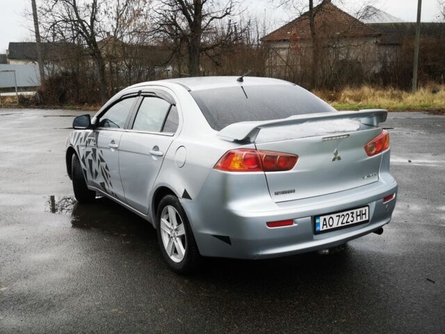 Серый Мицубиси Лансер, объемом двигателя 2 л и пробегом 260 тыс. км за 5200 $, фото 8 на Automoto.ua