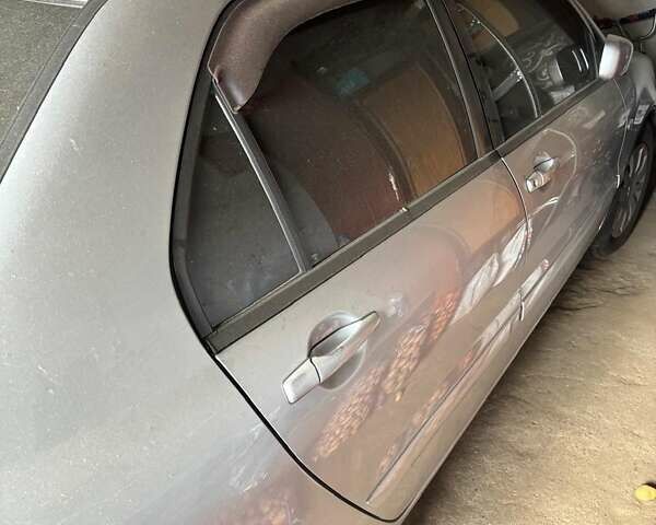 Мицубиси Лансер 2008 в Кропивницком (Кировограде) на Automoto.ua Серый Мицубиси Лансер, объемом двигателя 1.58 л и пробегом 175 тыс. км за 2000 $, фото 2 на Automoto.ua