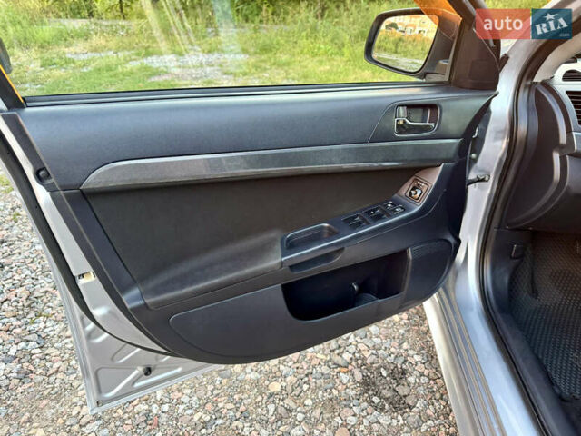 Сірий Міцубісі Lancer, об'ємом двигуна 2 л та пробігом 223 тис. км за 7390 $, фото 11 на Automoto.ua