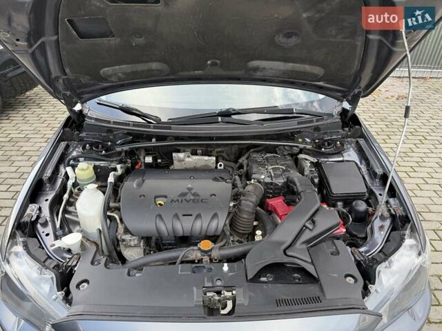 Серый Мицубиси Лансер, объемом двигателя 2 л и пробегом 230 тыс. км за 6900 $, фото 45 на Automoto.ua