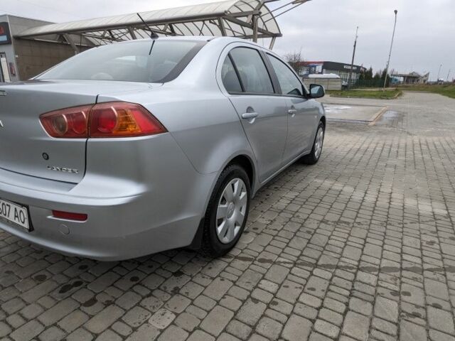 Серый Мицубиси Лансер, объемом двигателя 1.5 л и пробегом 147 тыс. км за 6700 $, фото 7 на Automoto.ua