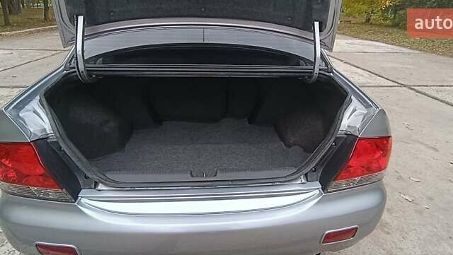 Сірий Міцубісі Lancer, об'ємом двигуна 1.6 л та пробігом 176 тис. км за 4999 $, фото 32 на Automoto.ua