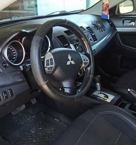Сірий Міцубісі Lancer, об'ємом двигуна 2 л та пробігом 77 тис. км за 9800 $, фото 4 на Automoto.ua