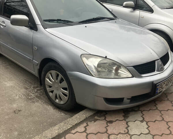 Сірий Міцубісі Lancer, об'ємом двигуна 1.58 л та пробігом 211 тис. км за 4400 $, фото 11 на Automoto.ua