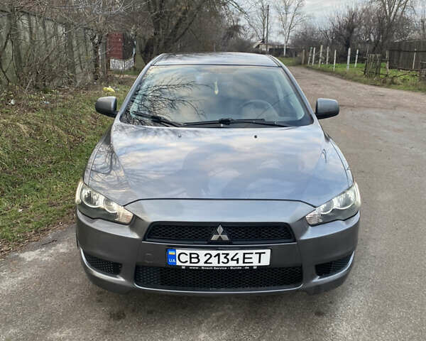 Серый Мицубиси Лансер, объемом двигателя 1.5 л и пробегом 255 тыс. км за 6500 $, фото 5 на Automoto.ua