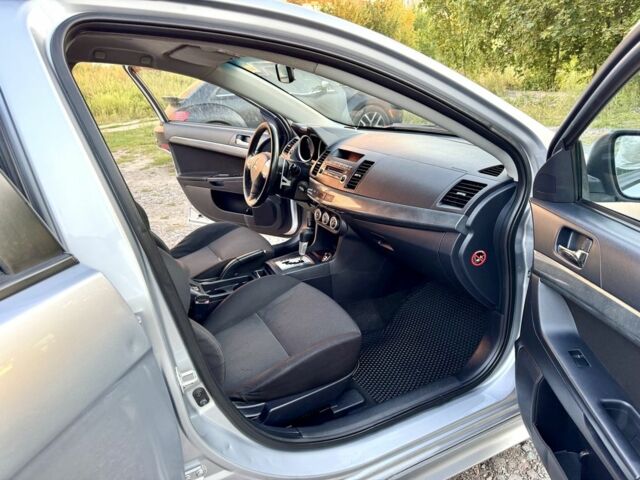 Сірий Міцубісі Lancer, об'ємом двигуна 2 л та пробігом 223 тис. км за 6890 $, фото 17 на Automoto.ua