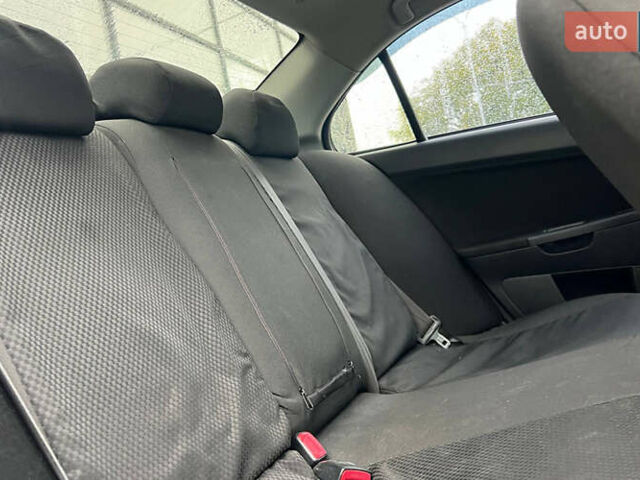 Серый Мицубиси Лансер, объемом двигателя 1.5 л и пробегом 239 тыс. км за 6000 $, фото 20 на Automoto.ua