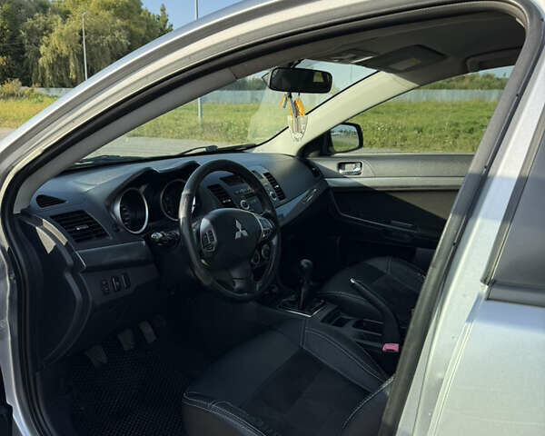 Сірий Міцубісі Lancer, об'ємом двигуна 2 л та пробігом 250 тис. км за 5999 $, фото 16 на Automoto.ua