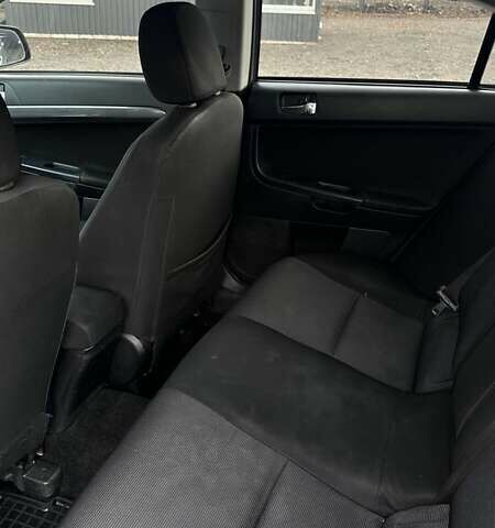 Сірий Міцубісі Lancer, об'ємом двигуна 2 л та пробігом 210 тис. км за 7100 $, фото 18 на Automoto.ua