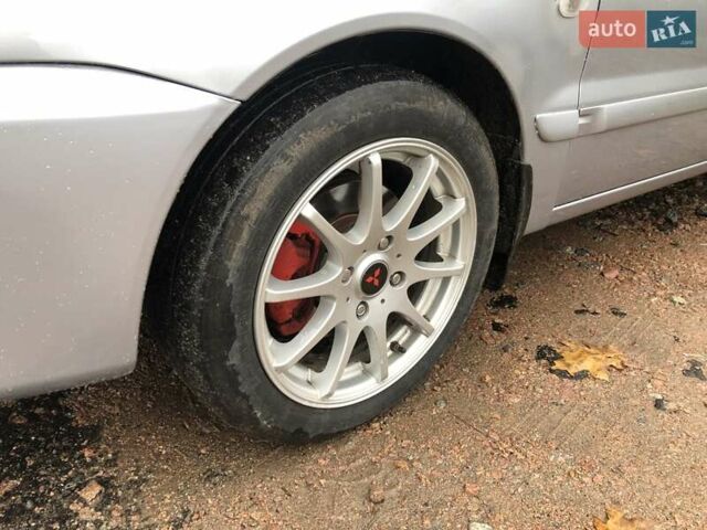 Серый Мицубиси Лансер, объемом двигателя 1.58 л и пробегом 268 тыс. км за 3450 $, фото 8 на Automoto.ua