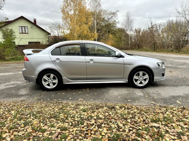 Серый Мицубиси Лансер, объемом двигателя 2 л и пробегом 225 тыс. км за 6890 $, фото 7 на Automoto.ua