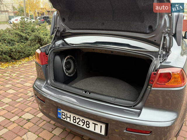 Сірий Міцубісі Lancer, об'ємом двигуна 2 л та пробігом 92 тис. км за 8200 $, фото 43 на Automoto.ua