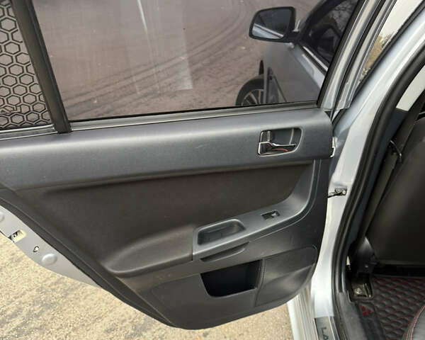 Сірий Міцубісі Lancer, об'ємом двигуна 2 л та пробігом 253 тис. км за 8700 $, фото 28 на Automoto.ua