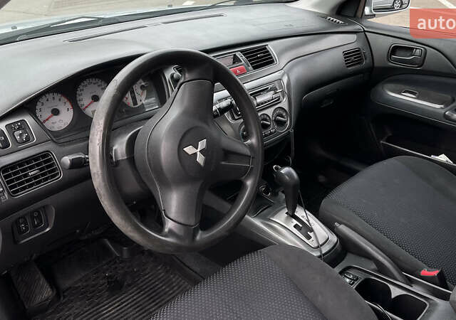 Мицубиси Лансер 2008 в Одессе на Automoto.ua Серый Мицубиси Лансер, объемом двигателя 1.6 л и пробегом 275 тыс. км за 3700 $, фото 10 на Automoto.ua