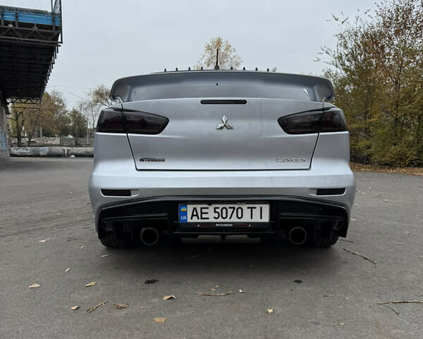 Сірий Міцубісі Lancer, об'ємом двигуна 2 л та пробігом 253 тис. км за 8700 $, фото 16 на Automoto.ua