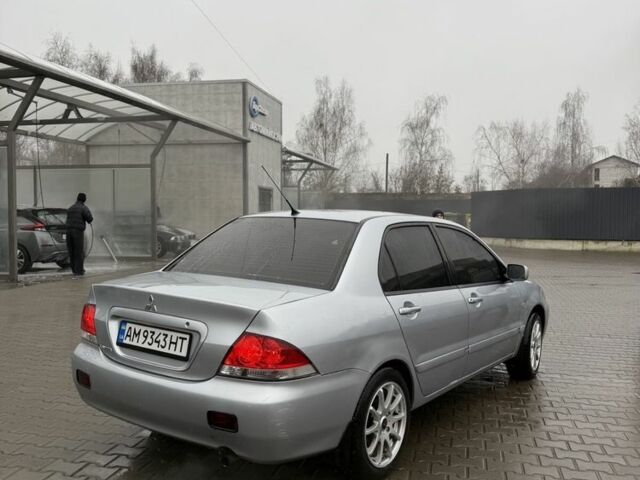 Серый Мицубиси Лансер, объемом двигателя 1.6 л и пробегом 158 тыс. км за 3150 $, фото 4 на Automoto.ua