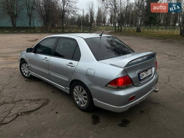 Сірий Міцубісі Lancer, об'ємом двигуна 1.6 л та пробігом 254 тис. км за 3800 $, фото 6 на Automoto.ua