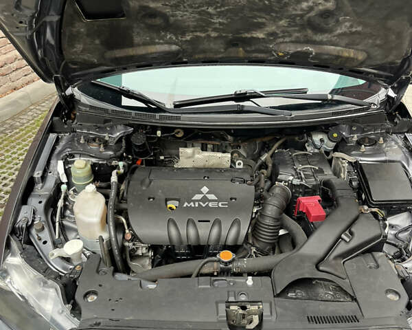 Сірий Міцубісі Lancer, об'ємом двигуна 2 л та пробігом 131 тис. км за 4899 $, фото 14 на Automoto.ua
