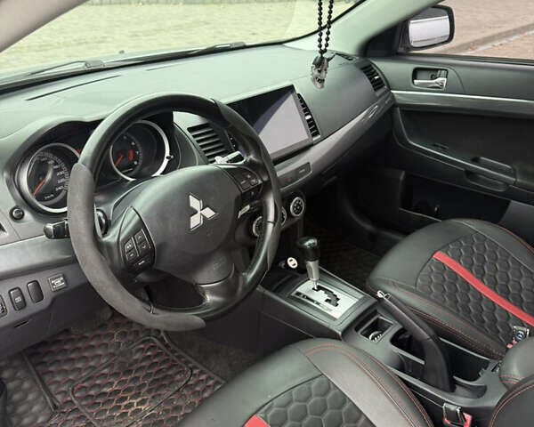 Сірий Міцубісі Lancer, об'ємом двигуна 2 л та пробігом 253 тис. км за 8700 $, фото 36 на Automoto.ua