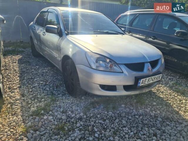 Сірий Міцубісі Lancer, об'ємом двигуна 1.6 л та пробігом 240 тис. км за 2999 $, фото 4 на Automoto.ua