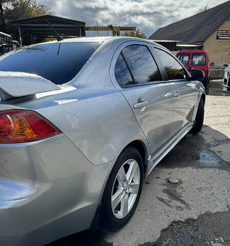 Серый Мицубиси Лансер, объемом двигателя 2 л и пробегом 190 тыс. км за 6900 $, фото 25 на Automoto.ua