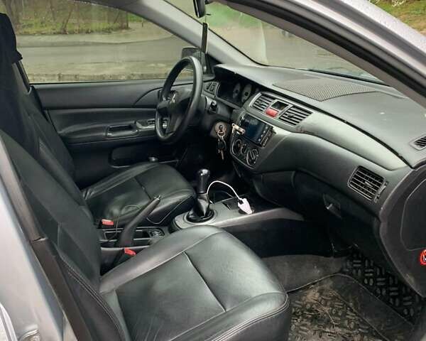 Мицубиси Лансер 2008 в Владимир-Волынский на Automoto.ua Серый Мицубиси Лансер, объемом двигателя 1.4 л и пробегом 268 тыс. км за 3700 $, фото 4 на Automoto.ua