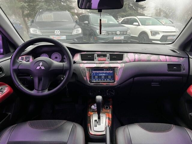 Серый Мицубиси Лансер, объемом двигателя 1.6 л и пробегом 205 тыс. км за 5400 $, фото 9 на Automoto.ua