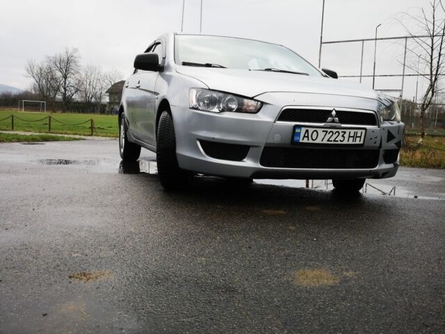 Серый Мицубиси Лансер, объемом двигателя 2 л и пробегом 260 тыс. км за 5200 $, фото 2 на Automoto.ua