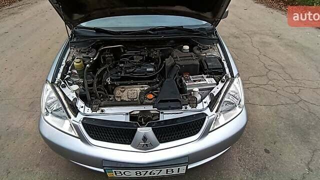 Серый Мицубиси Лансер, объемом двигателя 1.58 л и пробегом 176 тыс. км за 5000 $, фото 21 на Automoto.ua