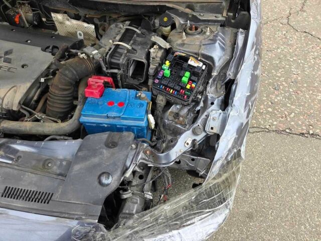 Сірий Міцубісі Lancer, об'ємом двигуна 1.8 л та пробігом 44 тис. км за 3300 $, фото 16 на Automoto.ua