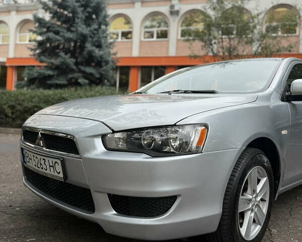 Серый Мицубиси Лансер, объемом двигателя 1.5 л и пробегом 193 тыс. км за 5800 $, фото 2 на Automoto.ua
