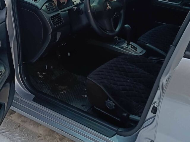 Серый Мицубиси Лансер, объемом двигателя 1.6 л и пробегом 180 тыс. км за 4750 $, фото 9 на Automoto.ua