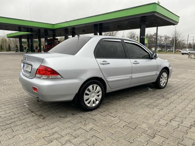 Сірий Міцубісі Lancer, об'ємом двигуна 1.6 л та пробігом 240 тис. км за 4650 $, фото 7 на Automoto.ua