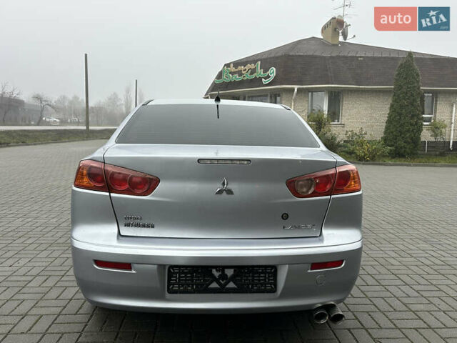 Серый Мицубиси Лансер, объемом двигателя 2 л и пробегом 279 тыс. км за 4999 $, фото 5 на Automoto.ua
