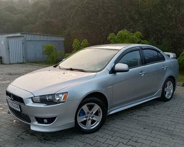 Серый Мицубиси Лансер, объемом двигателя 1.5 л и пробегом 304 тыс. км за 5200 $, фото 2 на Automoto.ua