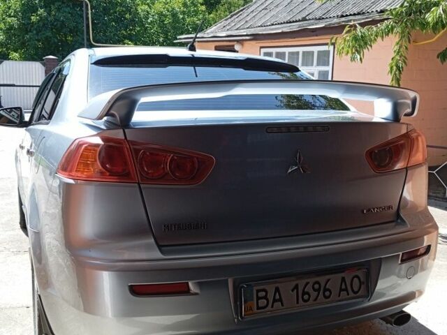 Сірий Міцубісі Lancer, об'ємом двигуна 2 л та пробігом 170 тис. км за 7500 $, фото 3 на Automoto.ua