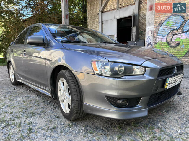 Серый Мицубиси Лансер, объемом двигателя 2 л и пробегом 222 тыс. км за 6999 $, фото 1 на Automoto.ua