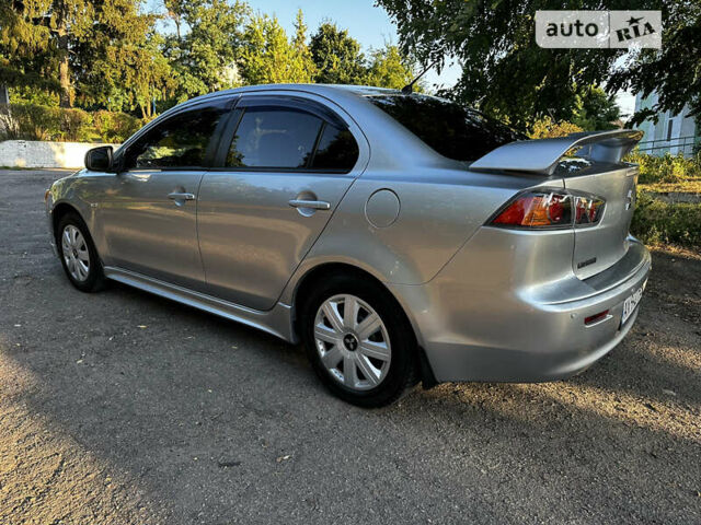 Сірий Міцубісі Lancer, об'ємом двигуна 2 л та пробігом 109 тис. км за 8500 $, фото 16 на Automoto.ua