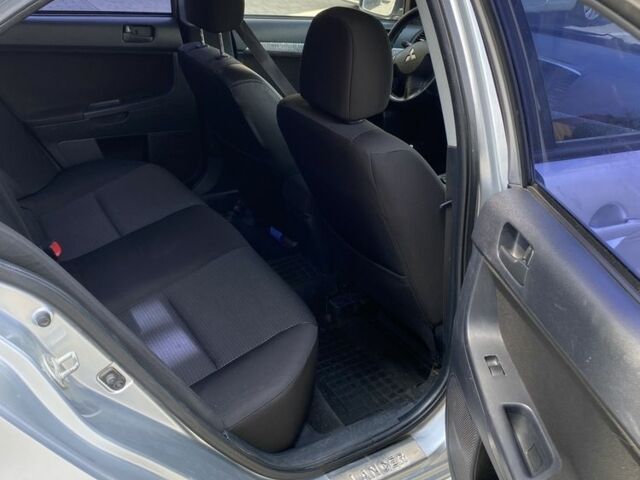 Сірий Міцубісі Lancer, об'ємом двигуна 1.5 л та пробігом 290 тис. км за 5300 $, фото 22 на Automoto.ua