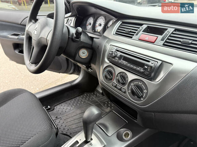 Сірий Міцубісі Lancer, об'ємом двигуна 0 л та пробігом 62 тис. км за 7250 $, фото 13 на Automoto.ua