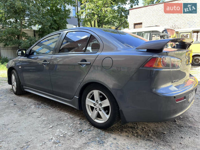 Серый Мицубиси Лансер, объемом двигателя 2 л и пробегом 222 тыс. км за 6999 $, фото 3 на Automoto.ua