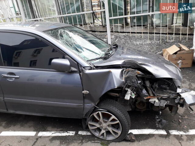 Міцубісі Lancer 2009 у Києві на Automoto.ua Сірий Міцубісі Lancer, об'ємом двигуна 1.6 л та пробігом 191 тис. км за 1500 $, фото 5 на Automoto.ua