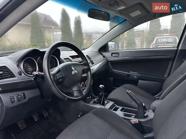 Серый Мицубиси Лансер, объемом двигателя 2 л и пробегом 279 тыс. км за 4999 $, фото 13 на Automoto.ua